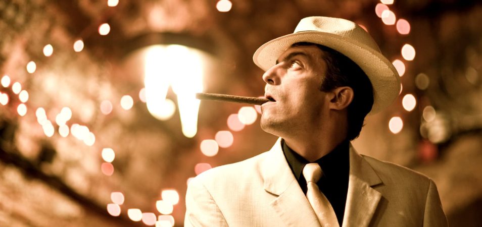 A gentleman in a hat with a cigar in his mouth, from the Mob Museum in Las Vegas, Nevada. 