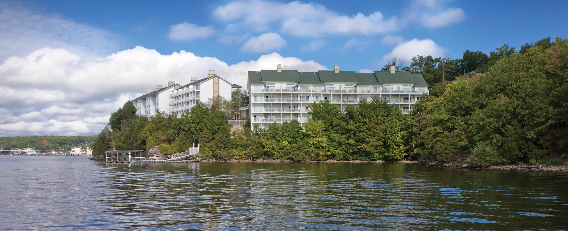 Lake and trees surrounding Worldmark Lake of the Ozarks, a timeshare resort in Osage Beach, Missouri.