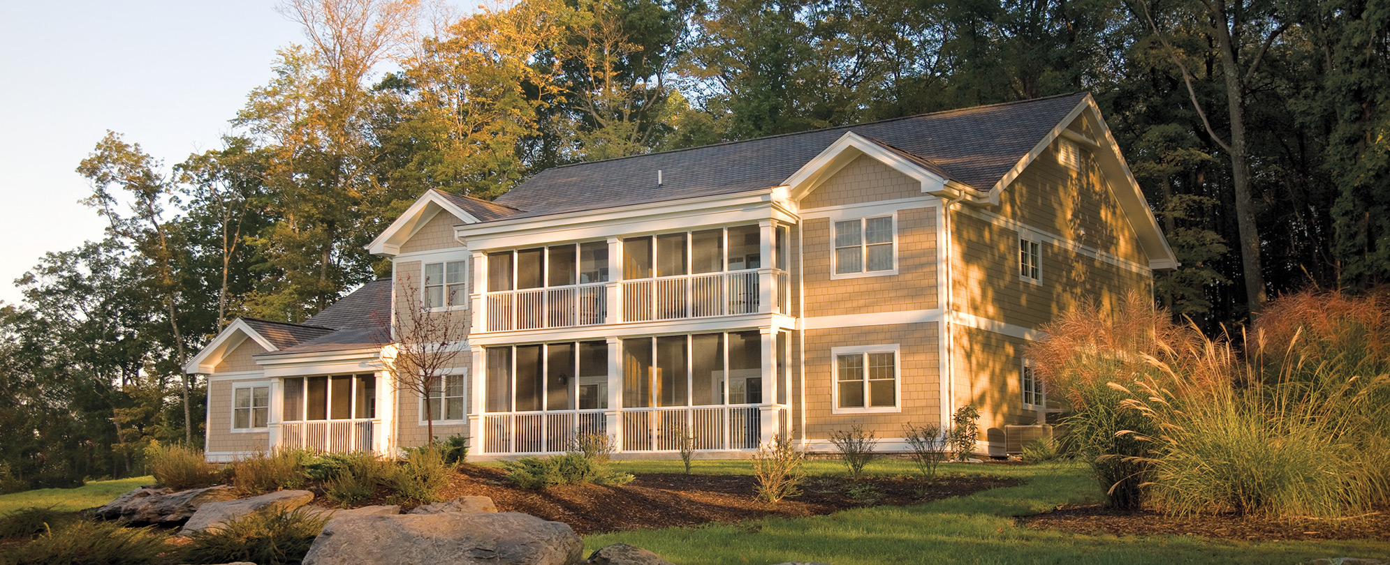 The exterior of Wyndham Shawnee Village, a timeshare resort in the Poconos, Pennsylvania, surrounded by trees and landscaping.